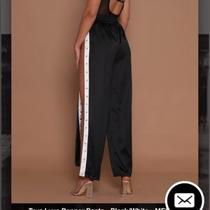 Meshki Black with white trim snap/ “popper” pants